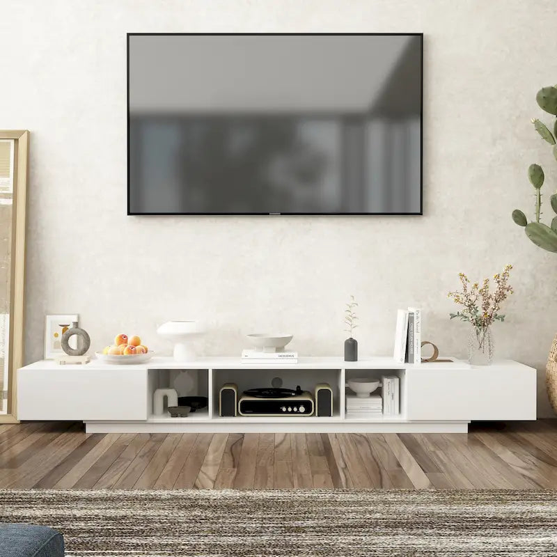 Meuble TV noir et blanc avec tiroirs et gestion des câbles, 240 cm.